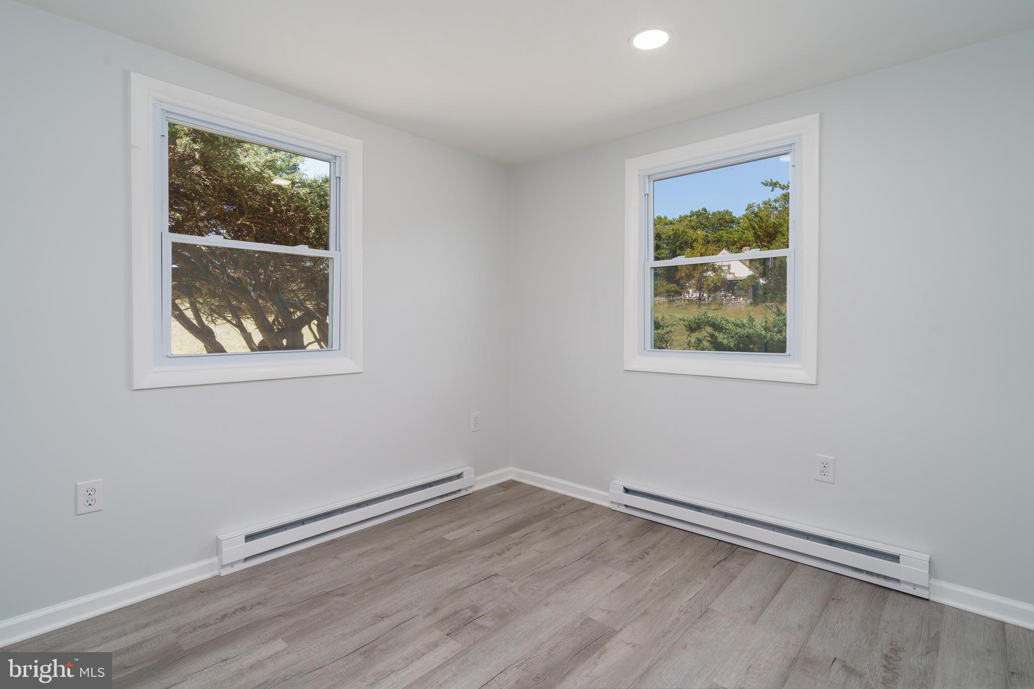 5781 Timber Ridge Road Berkeley Springs, WV 25411 - Photo 24 of 25 an empty room with a window