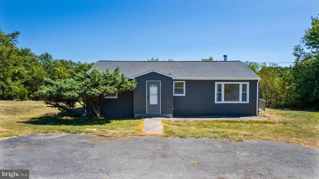 a house view with a garden space