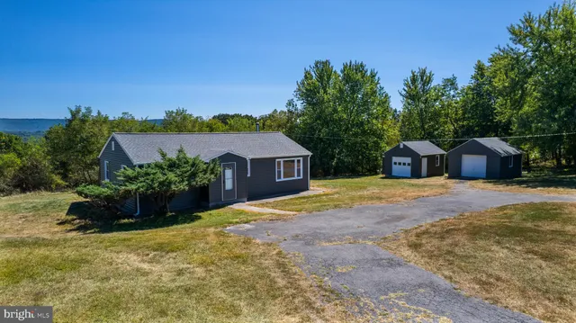 a house view with a garden space