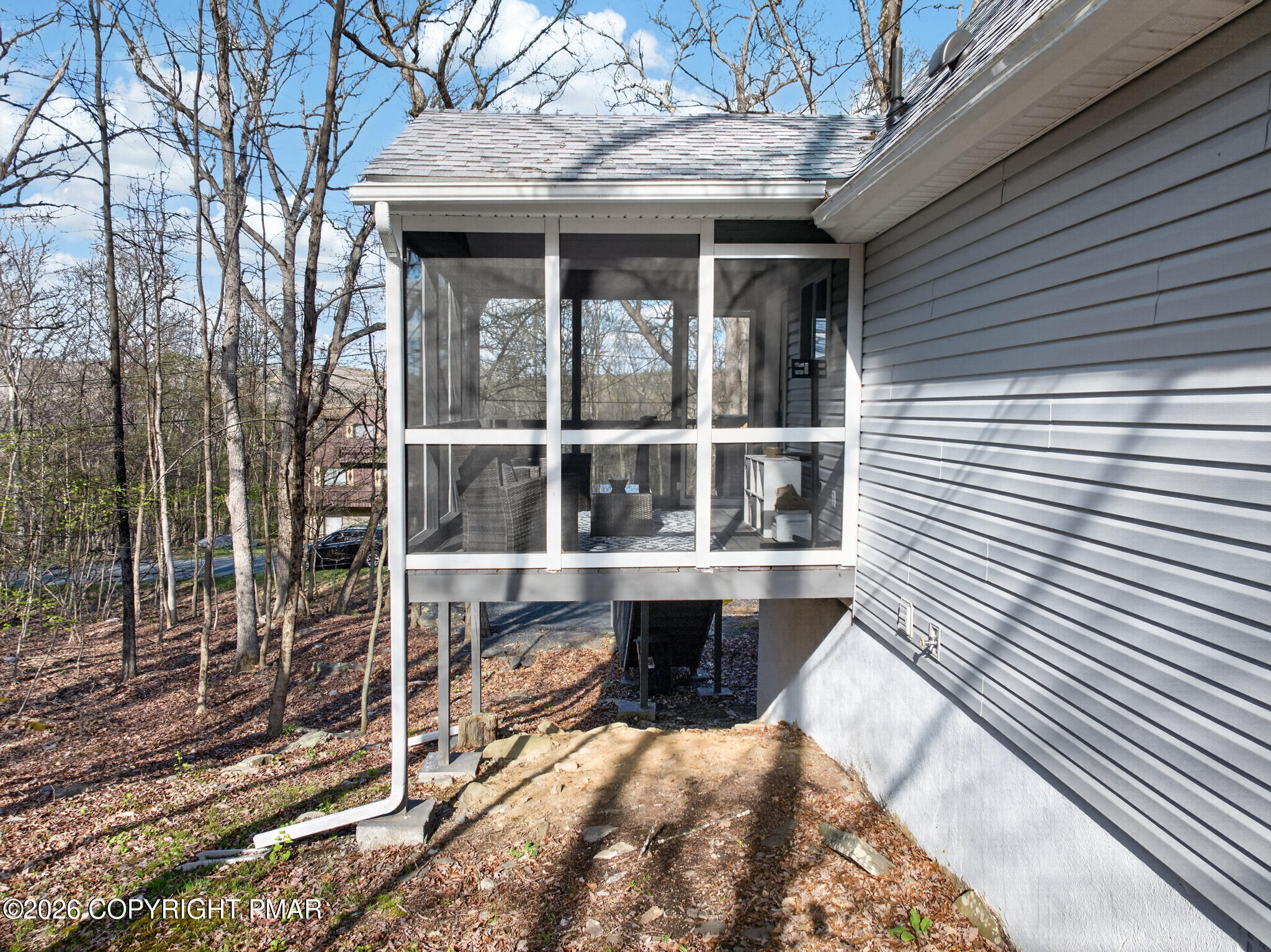 3166 Cherry Ridge Road Bushkill, PA 18324 - Photo 31 of 43 Exterior Screened Porch
