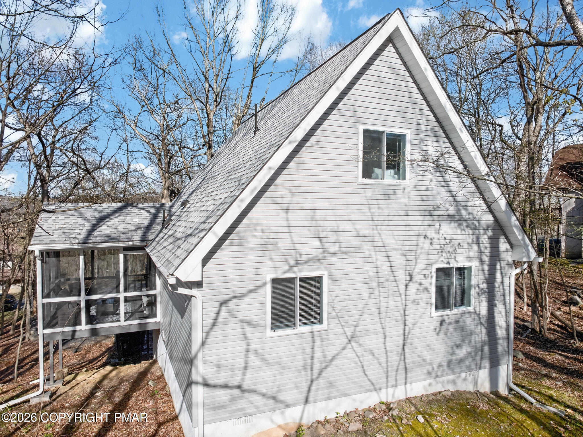 3166 Cherry Ridge Road Bushkill, PA 18324 - Photo 32 of 43 Back Exterior Screened Porch