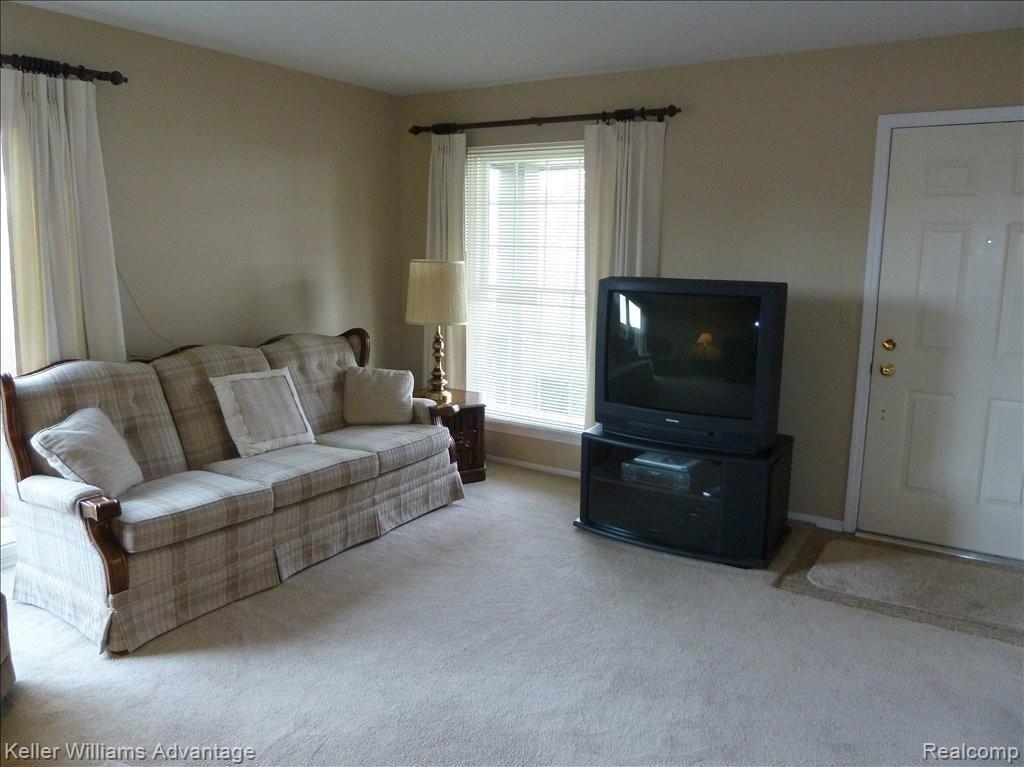 42460 Saratoga Road, Unit 9 Canton, MI 48187 - Photo 8 of 22 Spacious Living Room
