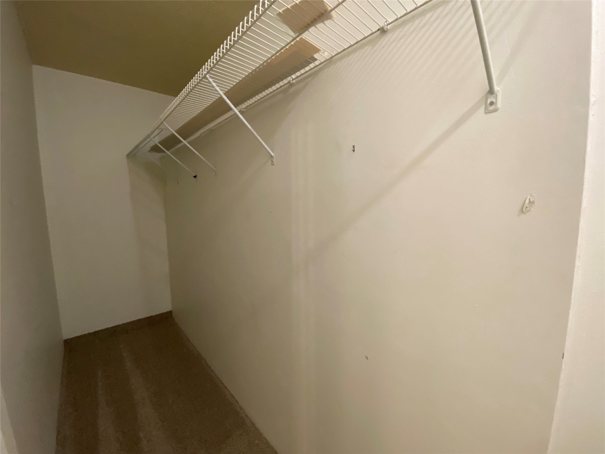 501 Bass Boat Village, Unit 106 Point Blank, TX 77364 - Photo 3 of 7 a view of a room with racks on the wall