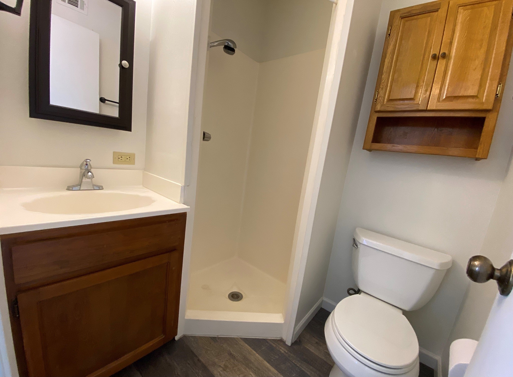 501 Bass Boat Village, Unit 106 Point Blank, TX 77364 - Photo 7 of 7 a bathroom with a sink a toilet and shower