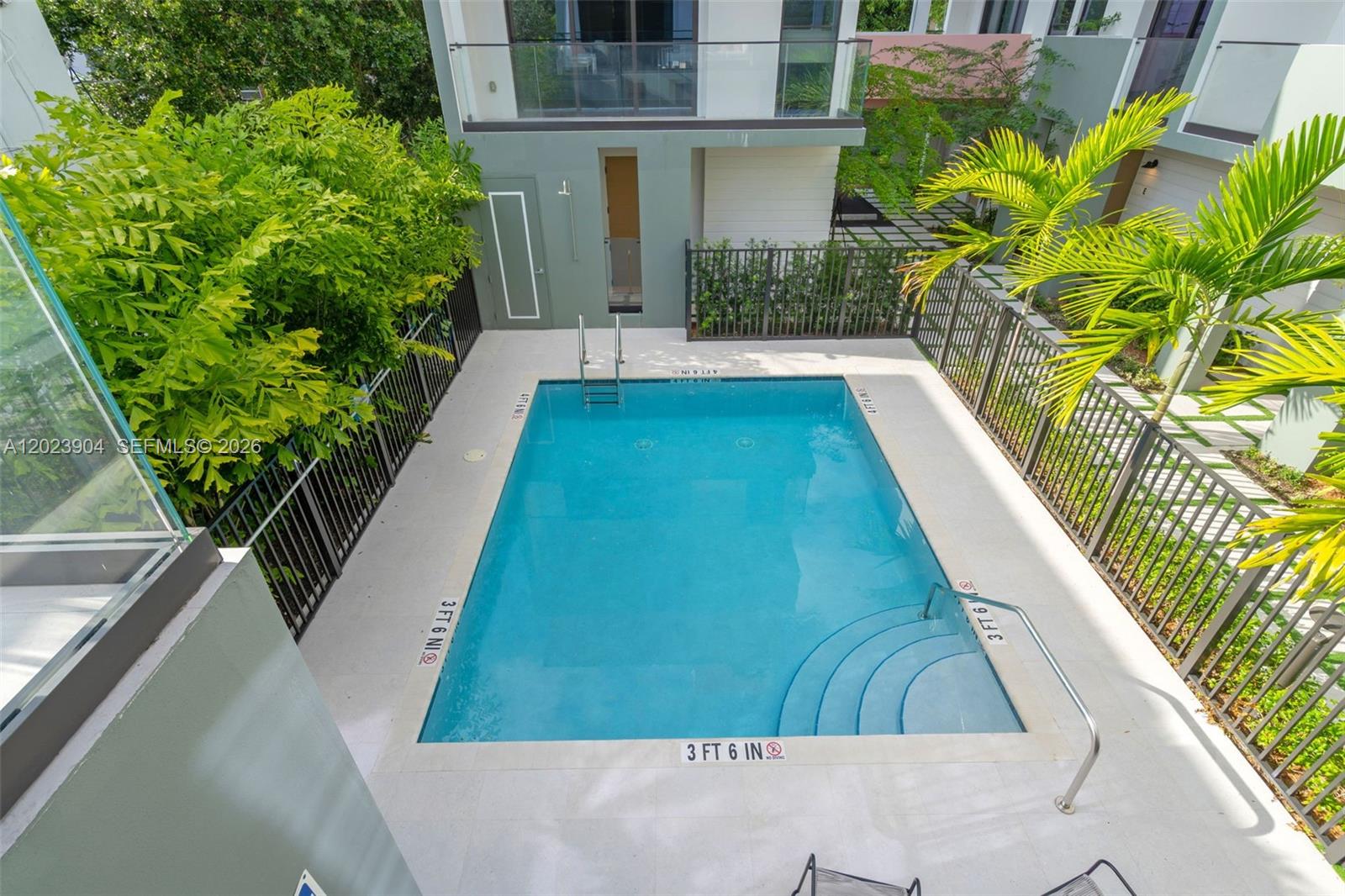721 Southwest 11th Street, Unit G Miami, FL 33129 - Photo 27 of 40 a view of a backyard with plants