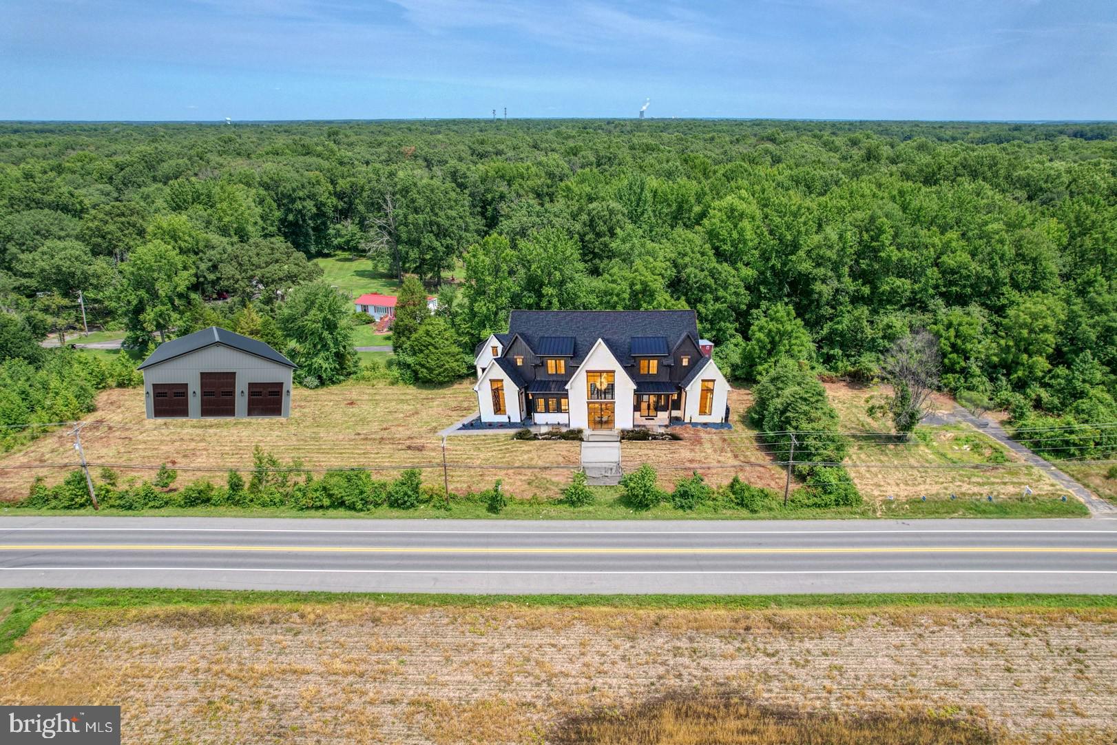 6147 Summit Bridge Road Townsend, DE 19734 - Photo 2 of 25 AI image of house and pole barn for reference