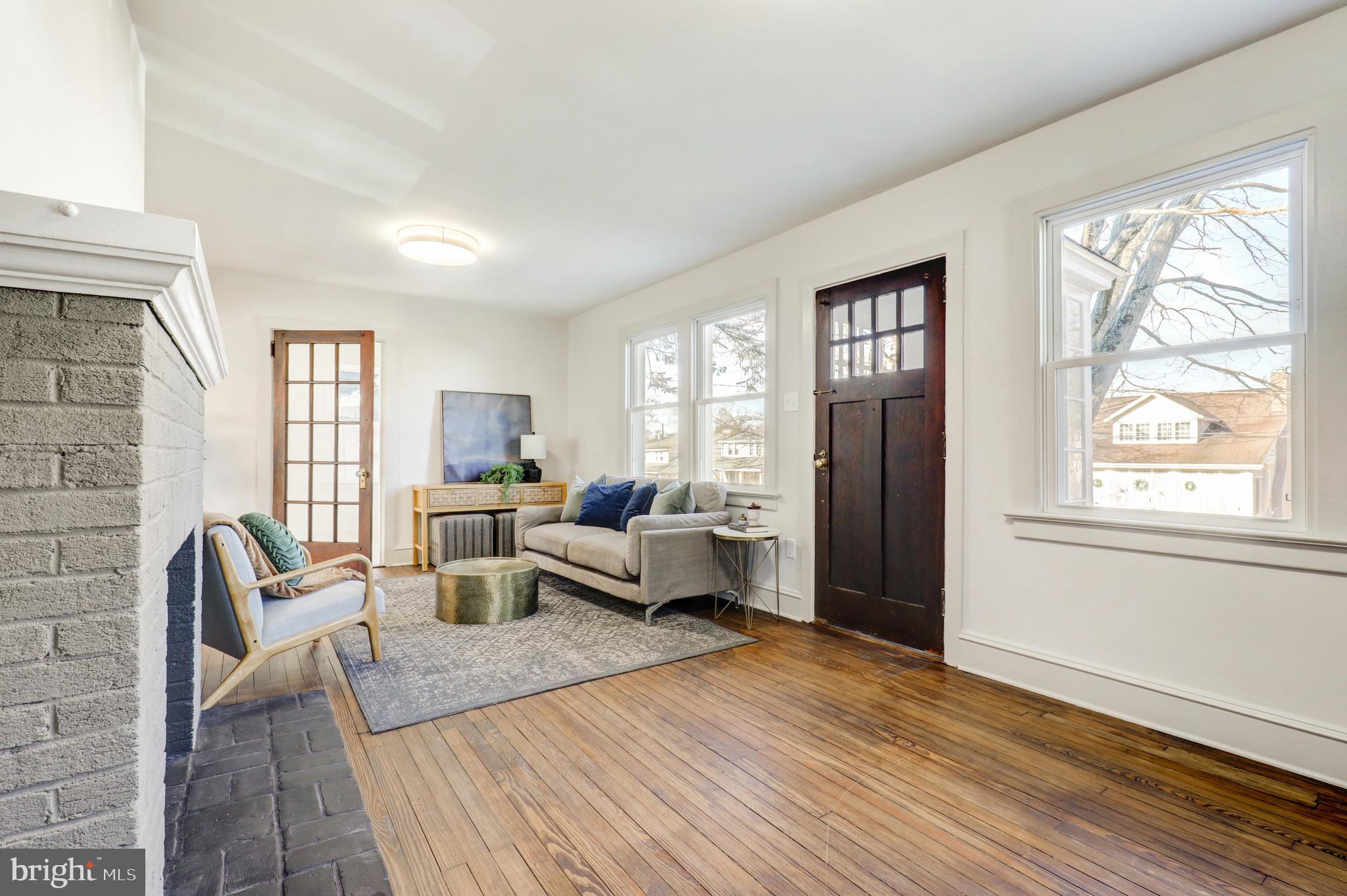 1081 Wynnwood Road Abington, PA 19001 - Photo 2 of 45 a living room with furniture and a window