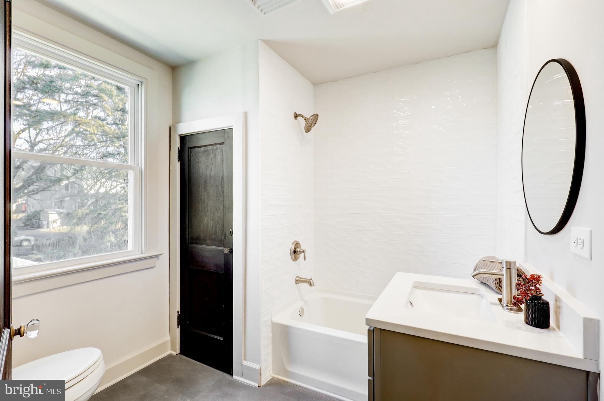 1081 Wynnwood Road Abington, PA 19001 - Photo 21 of 45 a bathroom with a sink and a mirror