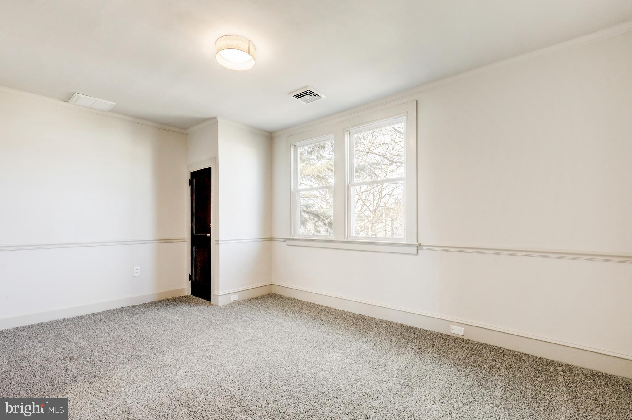 1081 Wynnwood Road Abington, PA 19001 - Photo 27 of 45 wooden floor in an empty room with a window