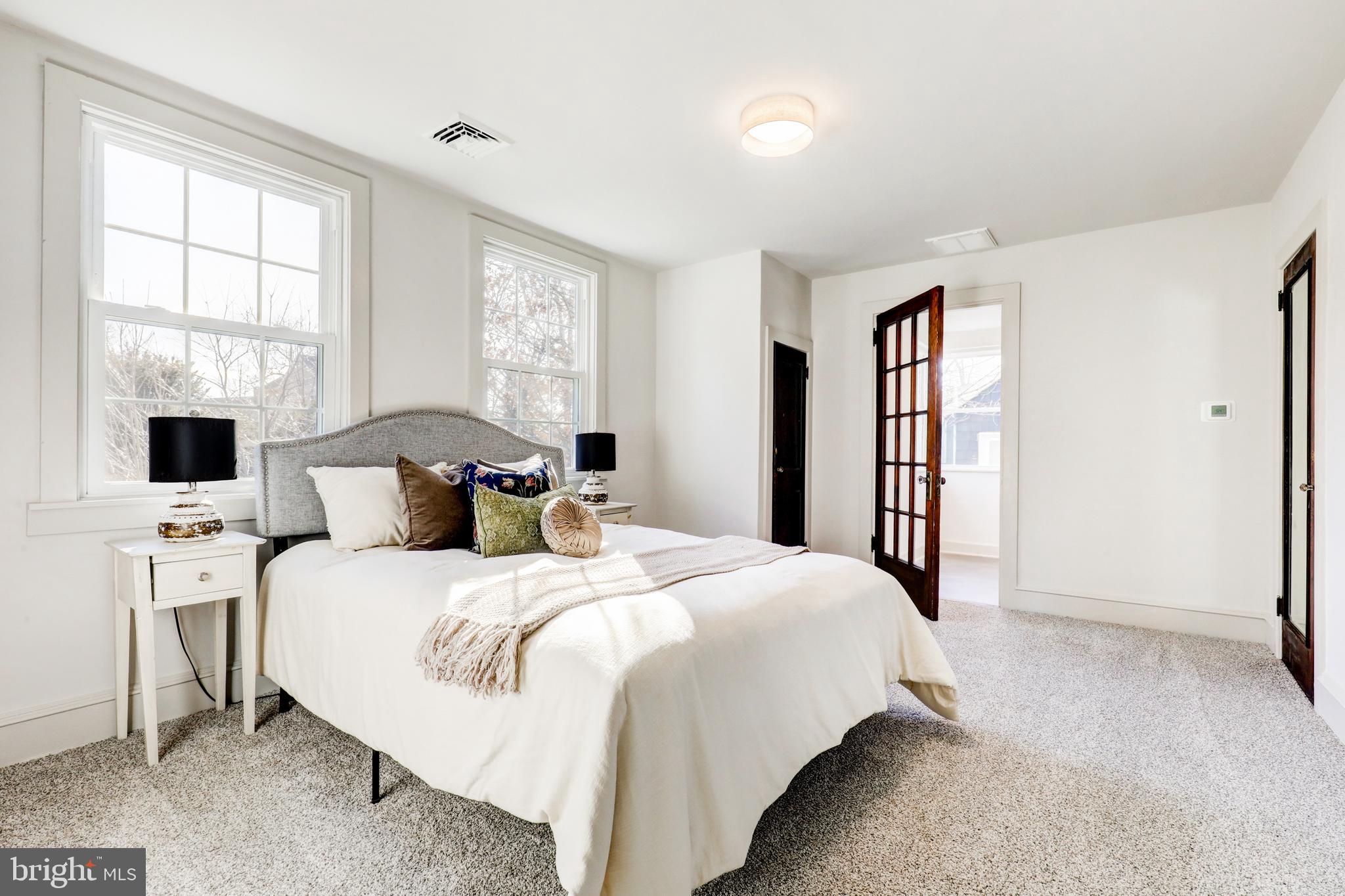 1081 Wynnwood Road Abington, PA 19001 - Photo 29 of 45 a bedroom with a bed and a window