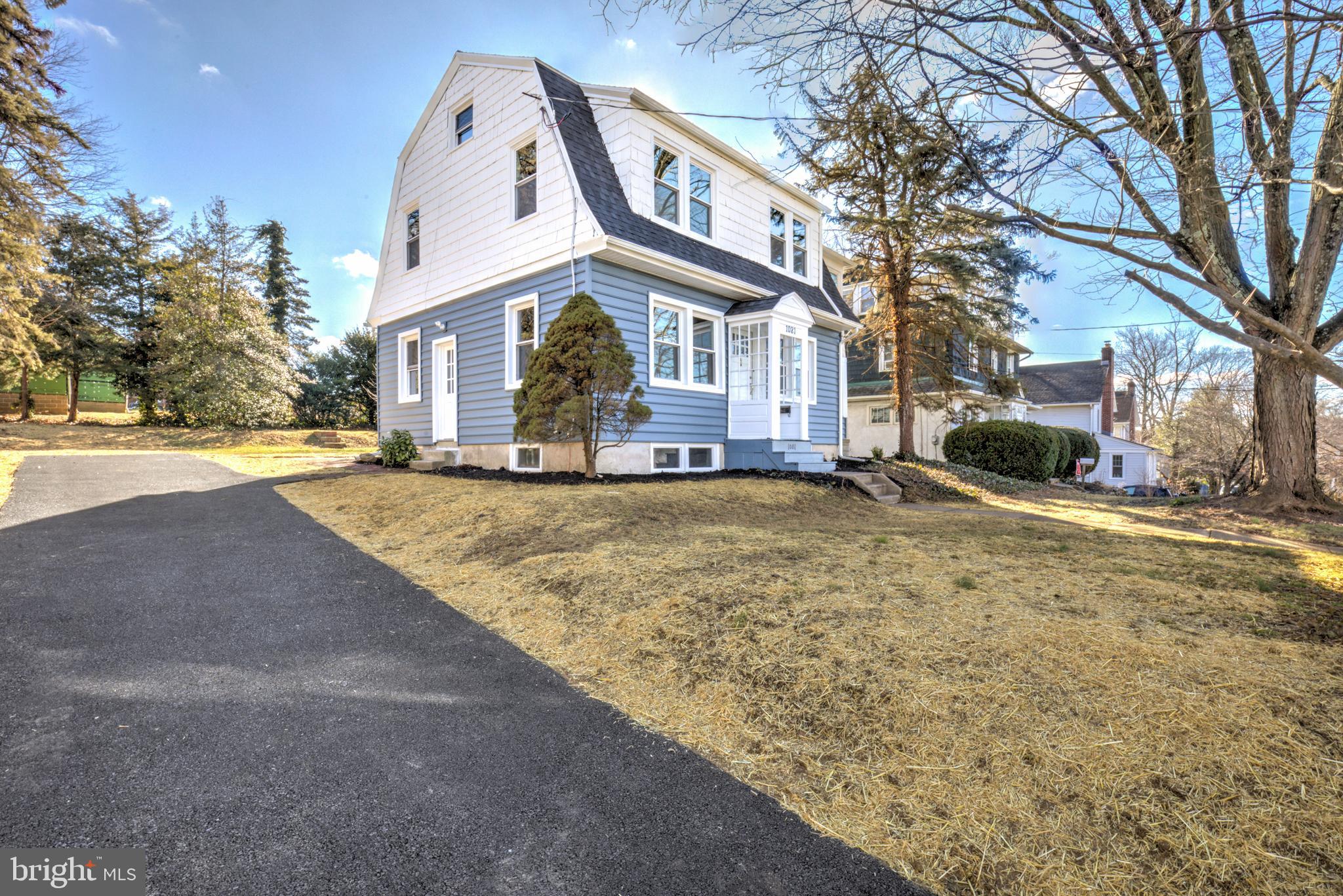 1081 Wynnwood Road Abington, PA 19001 - Photo 42 of 45 a large tree in front of a white house