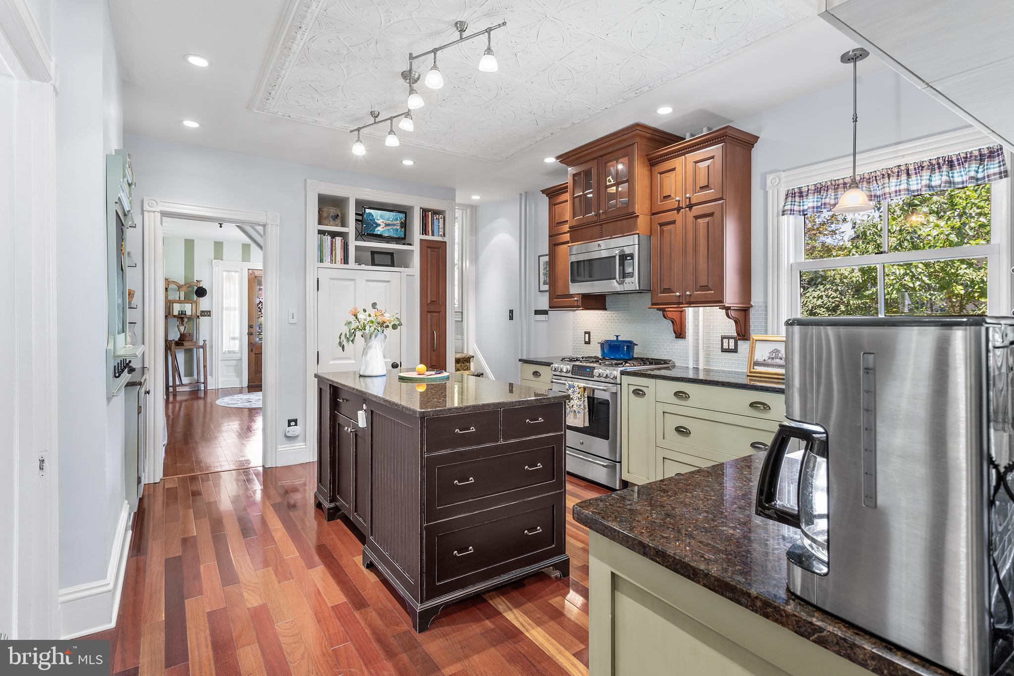 960 Lawrence Road Lawrenceville, NJ 08648 - Photo 19 of 62 a kitchen with a refrigerator oven stove and a sink