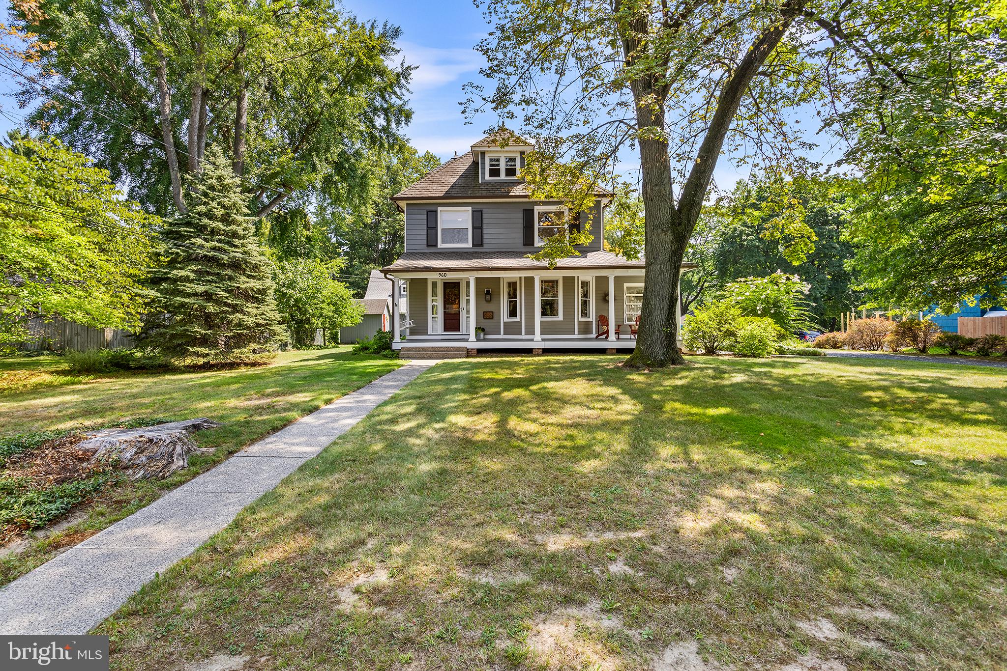 960 Lawrence Road Lawrenceville, NJ 08648 - Photo 2 of 62 a view of a house with a big yard and large trees