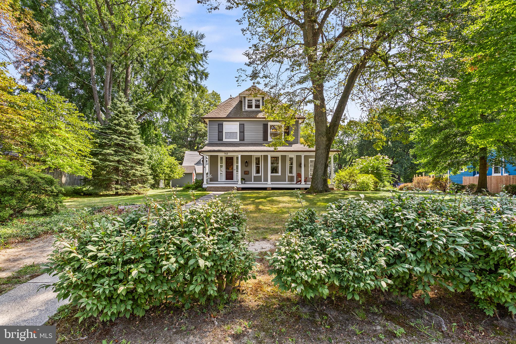 960 Lawrence Road Lawrenceville, NJ 08648 - Photo 3 of 62 a front view of a house with a yard