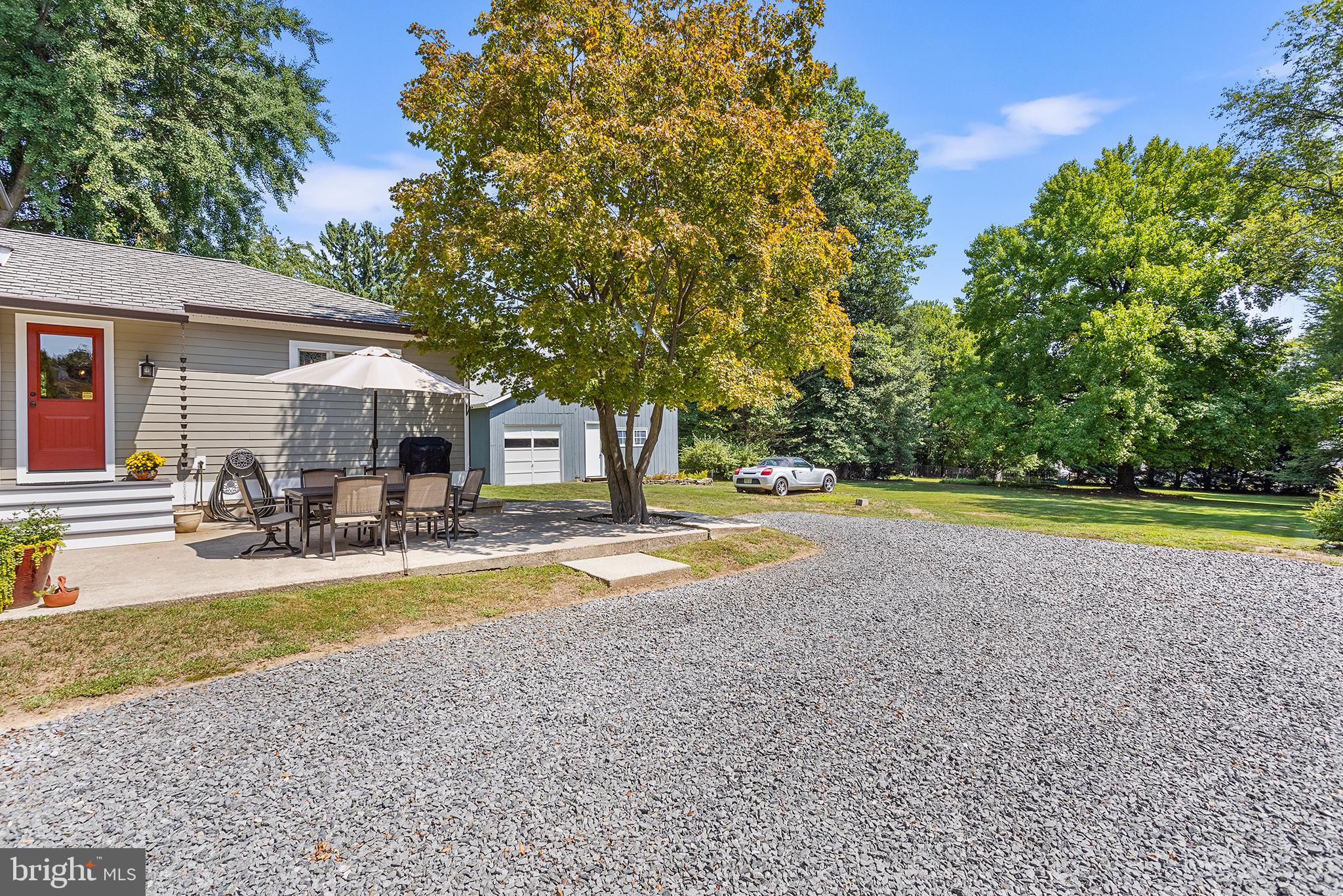 960 Lawrence Road Lawrenceville, NJ 08648 - Photo 51 of 62 a view of a house with swimming pool and sitting area