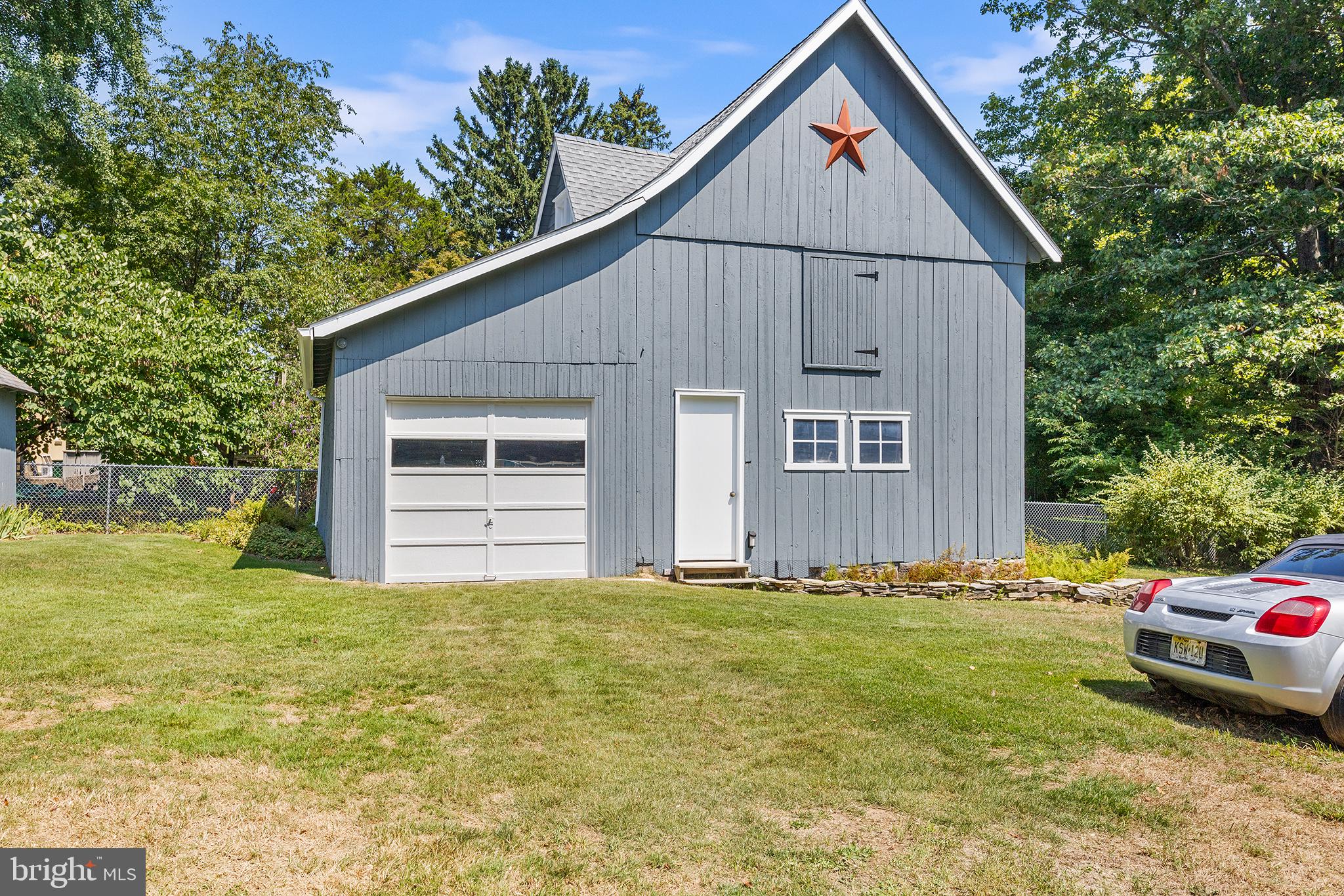 960 Lawrence Road Lawrenceville, NJ 08648 - Photo 53 of 62 a view of front of house with a yard