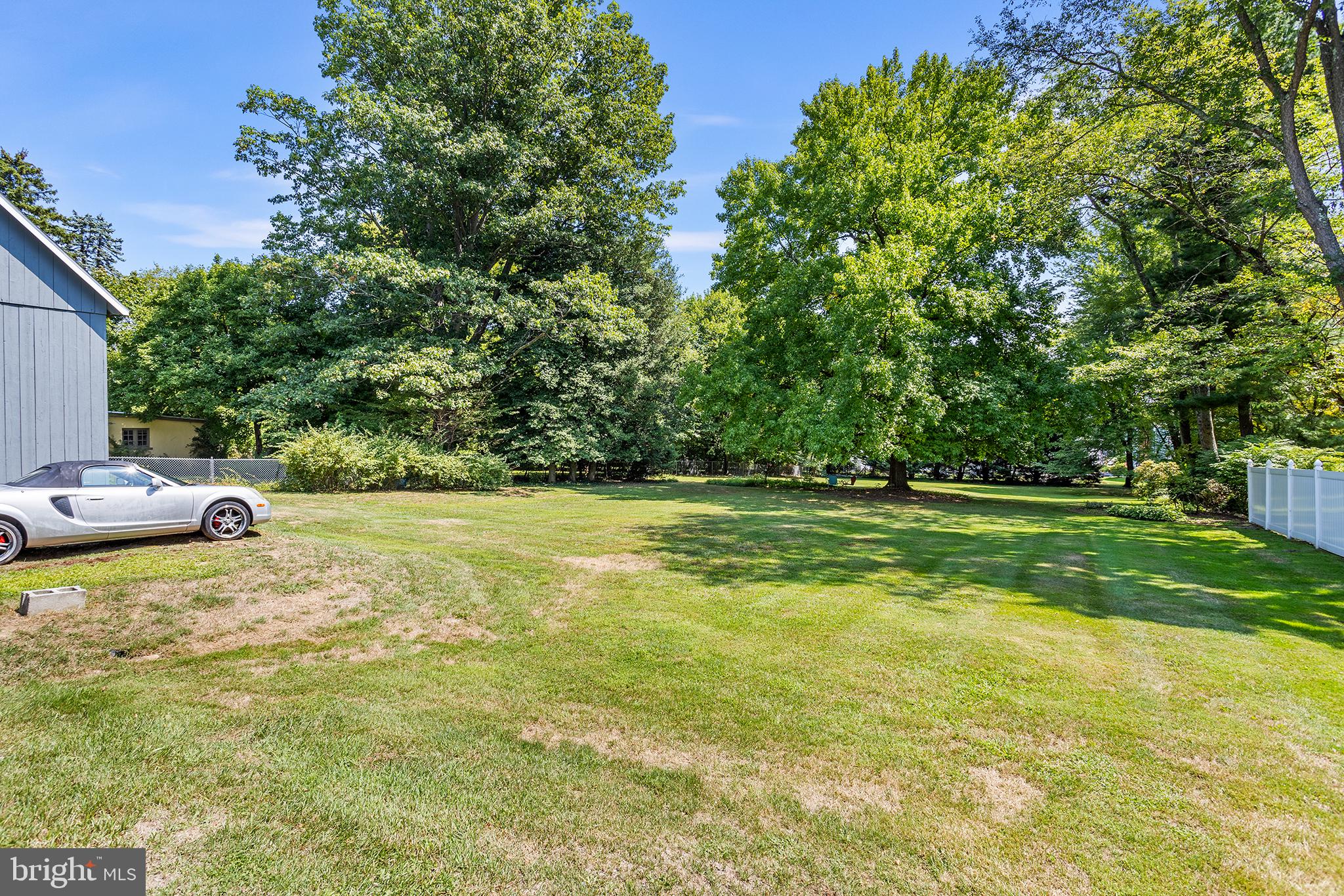 960 Lawrence Road Lawrenceville, NJ 08648 - Photo 54 of 62 a view of yard with swimming pool and green space