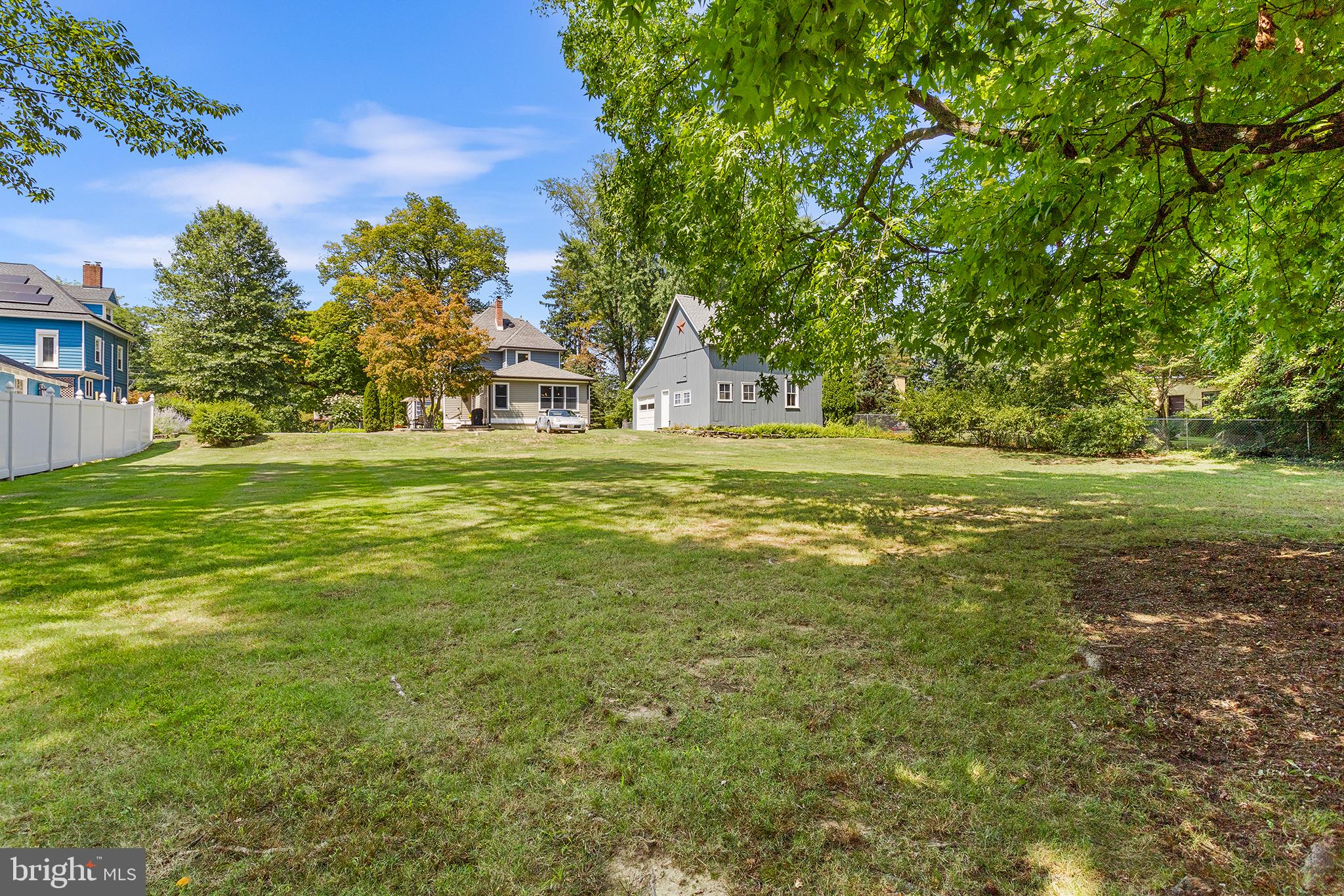 960 Lawrence Road Lawrenceville, NJ 08648 - Photo 55 of 62 a big yard with lots of green space and trees in the back