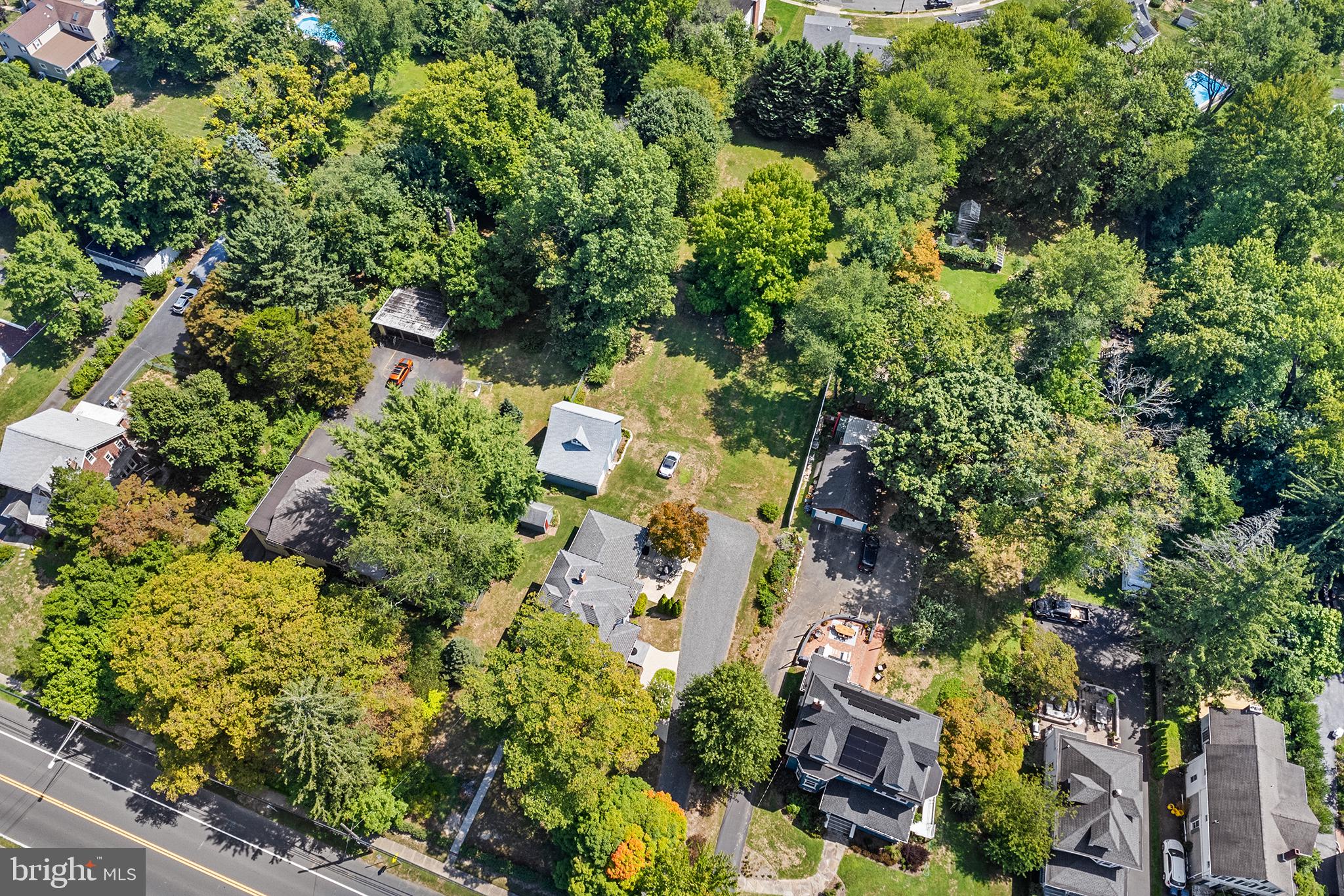 960 Lawrence Road Lawrenceville, NJ 08648 - Photo 57 of 62 an aerial view of residential house with outdoor space and trees all around