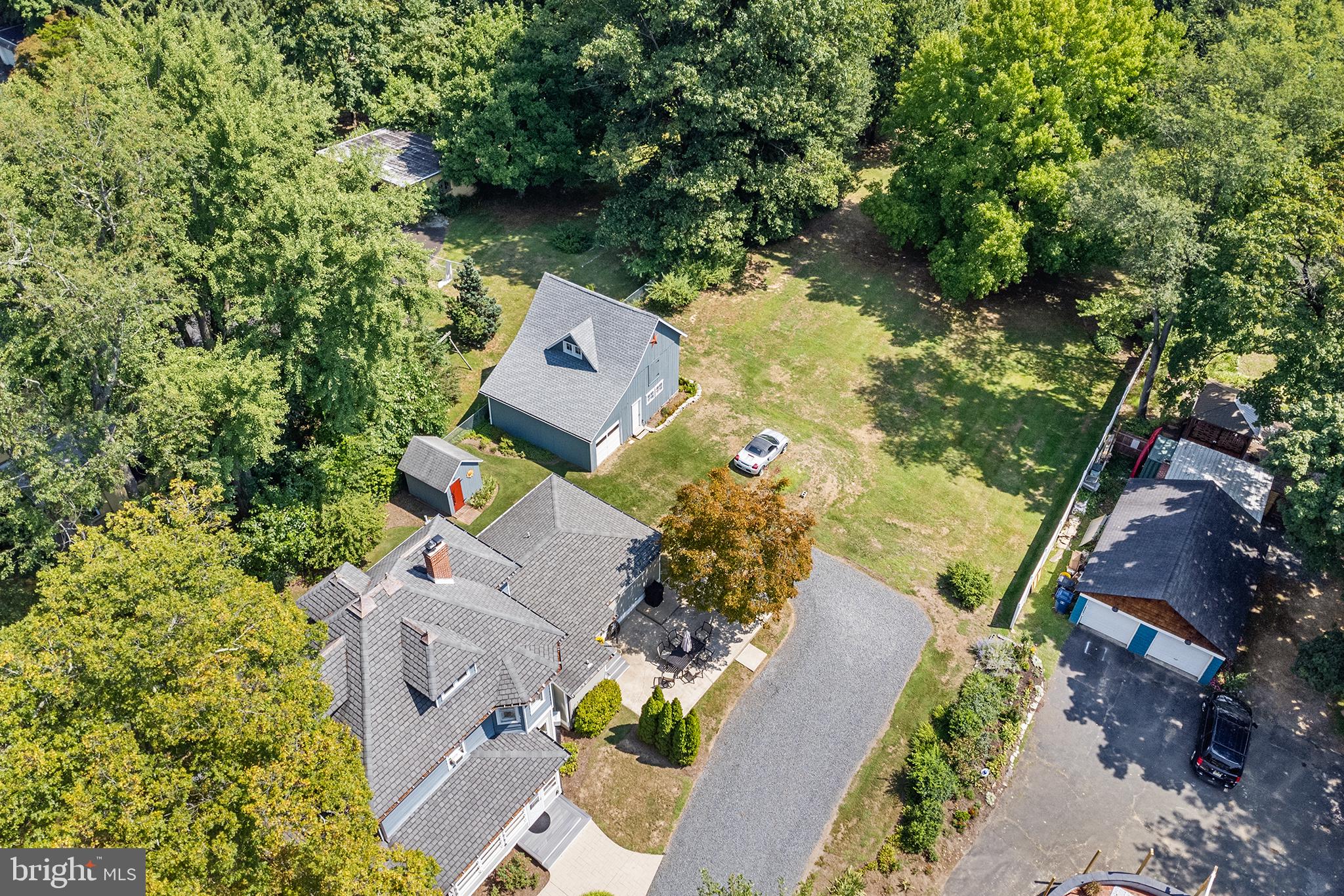 960 Lawrence Road Lawrenceville, NJ 08648 - Photo 58 of 62 an aerial view of a house with yard swimming pool and outdoor seating