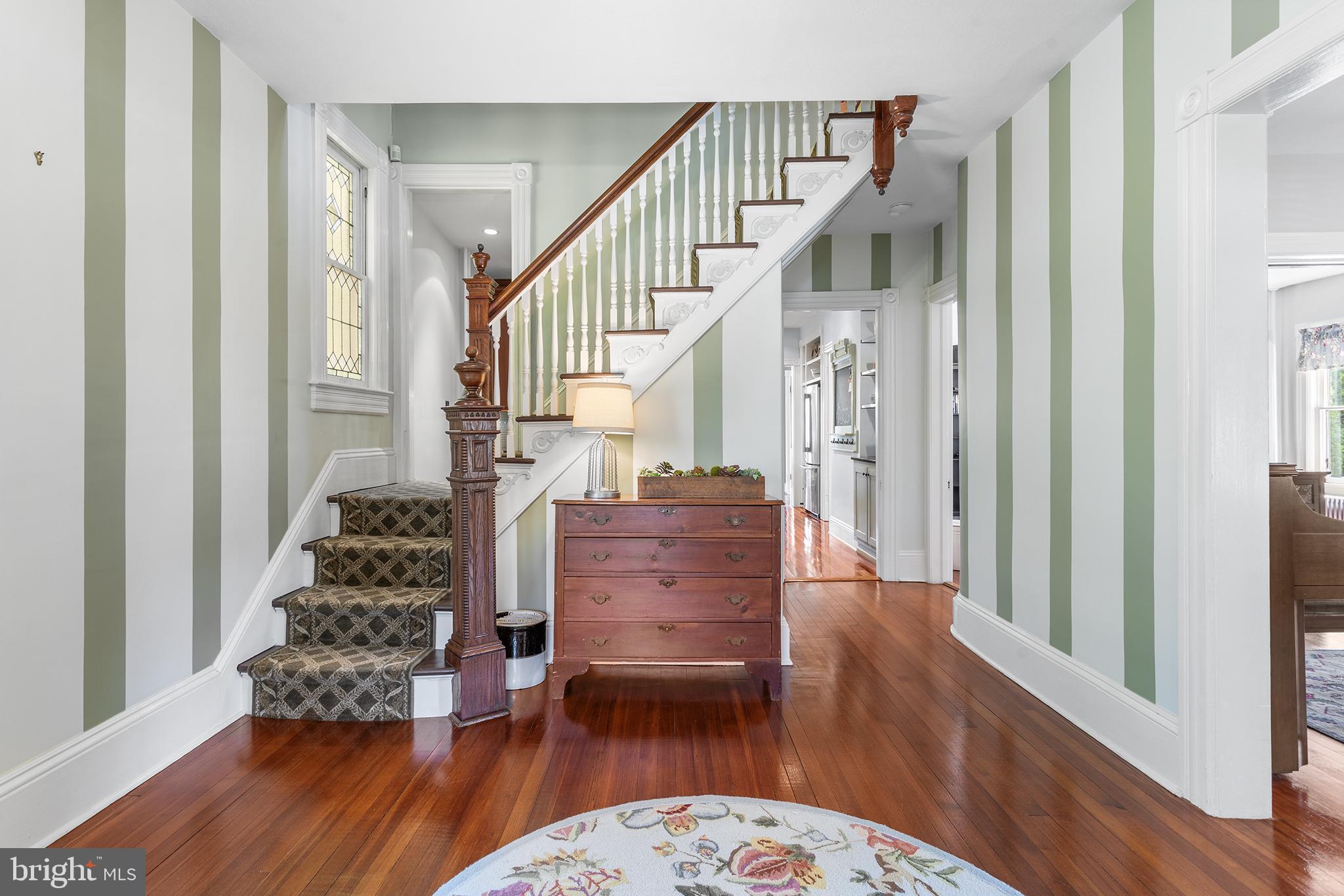 960 Lawrence Road Lawrenceville, NJ 08648 - Photo 10 of 62 a living room with furniture and wooden floor