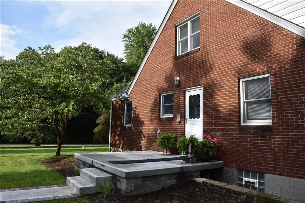201 Brown Road Wexford, PA 15090 - Photo 22 of 25 Side entrance with new decorative walkway and porch.