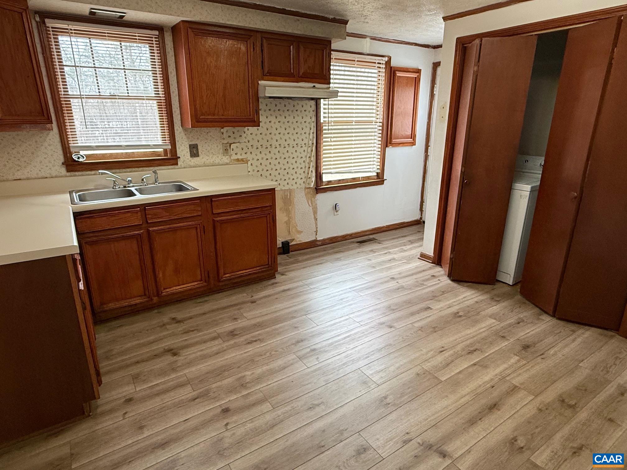 2375 Earlysville Road Earlysville, VA 22936 - Photo 12 of 38 a view of kitchen with wooden floor and electronic appliances