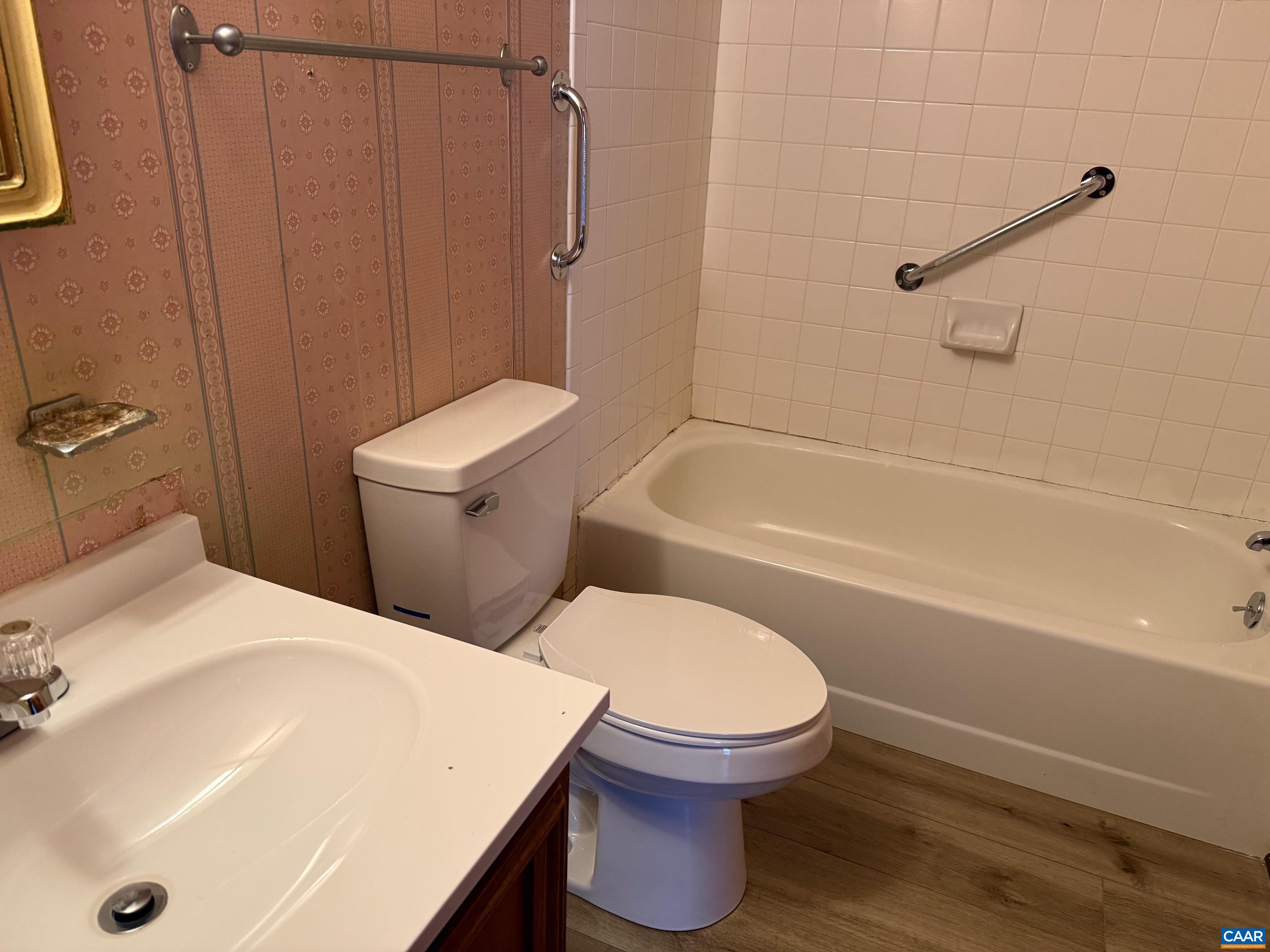 2375 Earlysville Road Earlysville, VA 22936 - Photo 17 of 38 a bathroom with a sink a toilet and shower