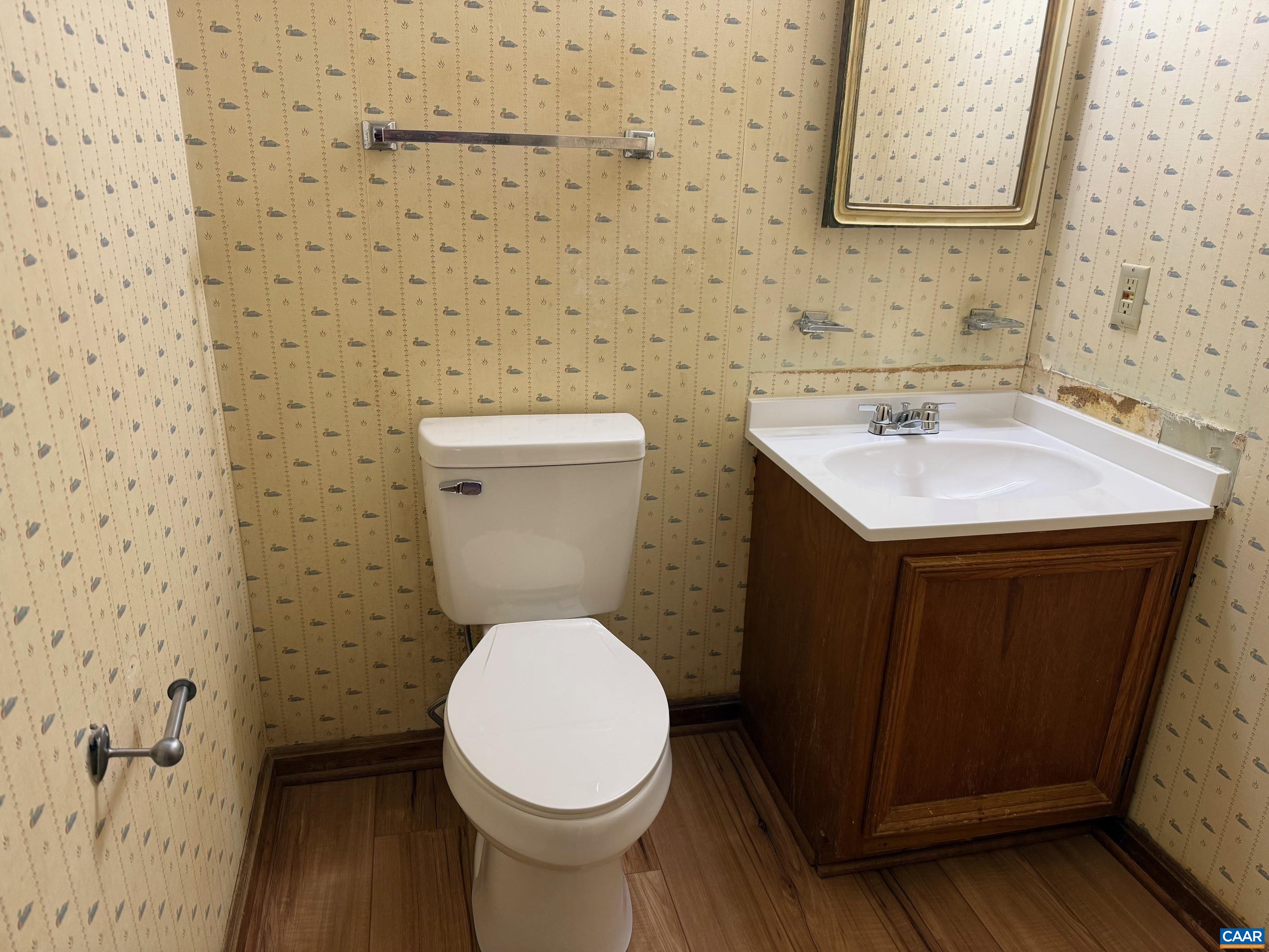 2375 Earlysville Road Earlysville, VA 22936 - Photo 22 of 38 a bathroom with a sink a toilet and a mirror