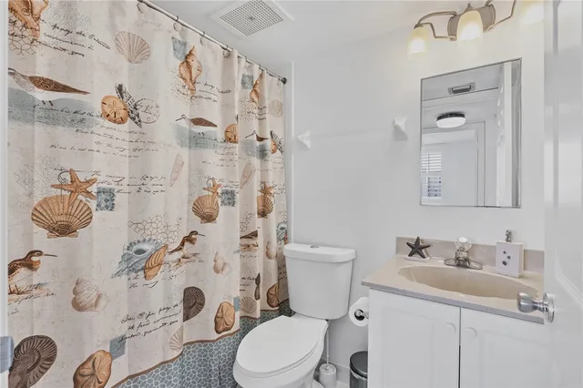 a view of swimming pool from a balcony