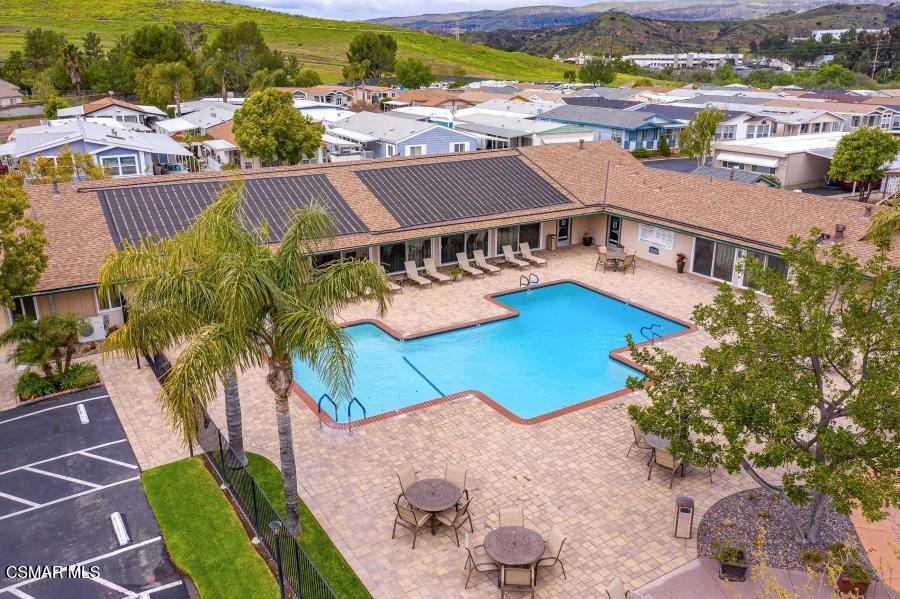 195 Tierra Rejada Road, Unit 71 Simi Valley, CA 93065 - Photo 11 of 15 an aerial view of residential houses with outdoor space and swimming pool