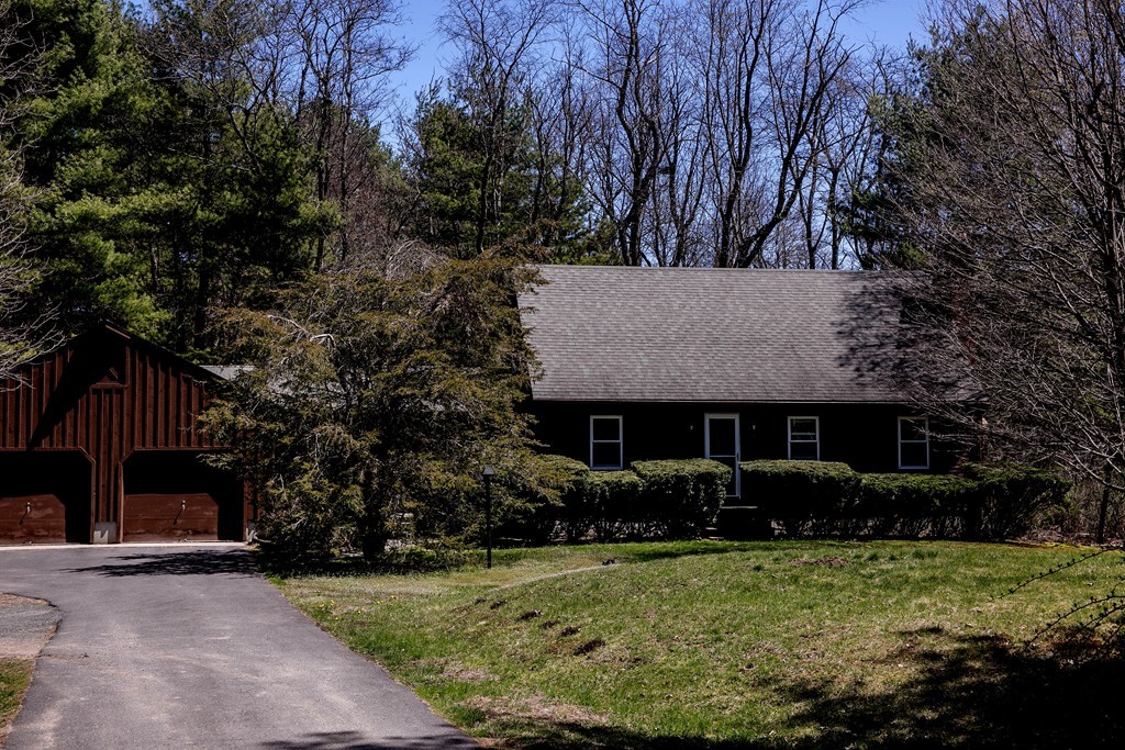 5 Cook Road Southampton, MA 01073 - Photo 1 of 27 a view of a house with backyard and garden
