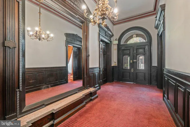 a view of lobby with chandelier