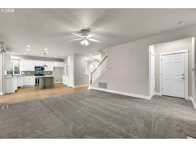 a view of a kitchen and a kitchen counter top space
