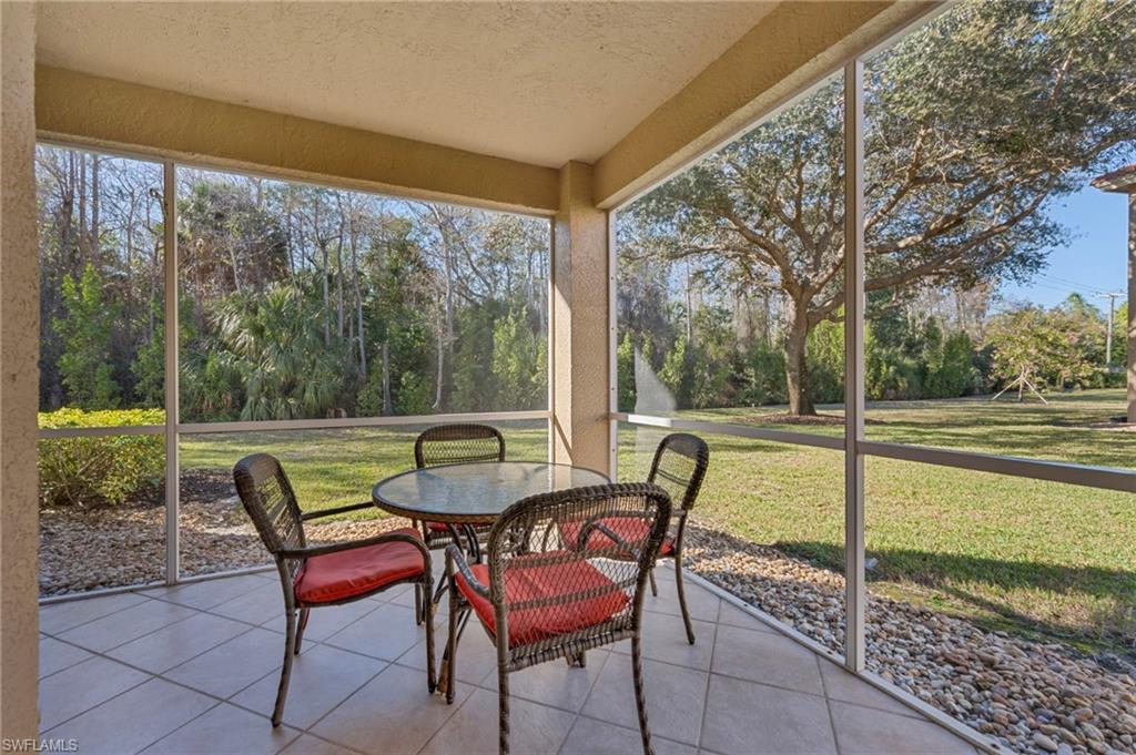 6765 Huntington Lakes Circle, Unit 102 Naples, FL 34119 - Photo 14 of 22 Screened Lanai with Expansive View and Exceptional Privacy
