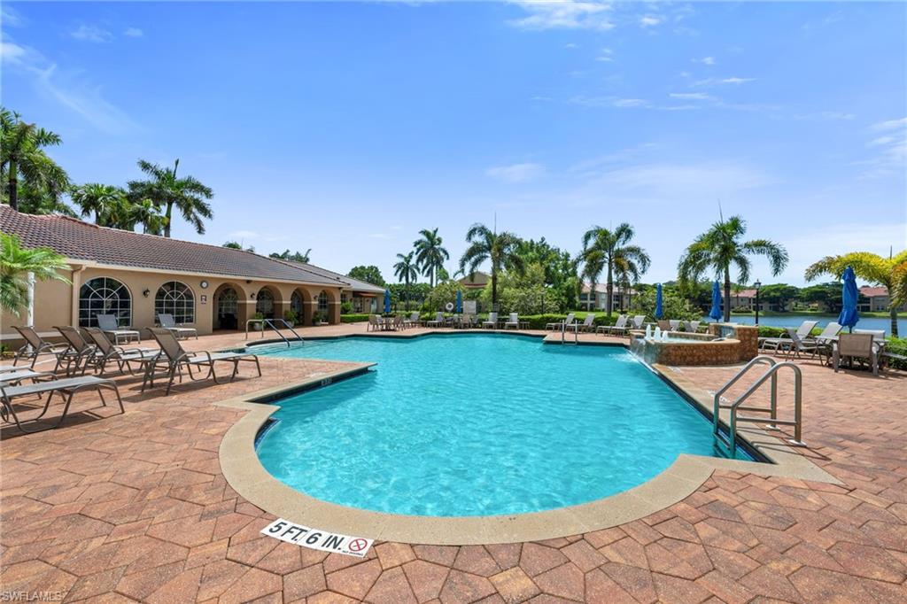 6765 Huntington Lakes Circle, Unit 102 Naples, FL 34119 - Photo 16 of 22 Resort Style Pool at Clubhouse