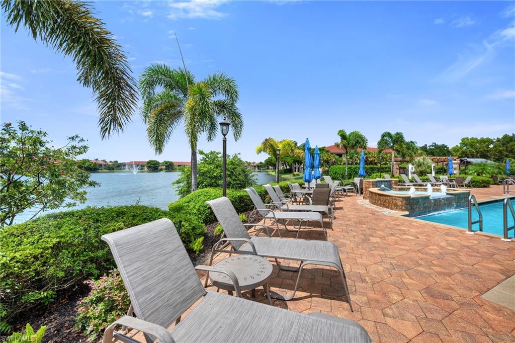 6765 Huntington Lakes Circle, Unit 102 Naples, FL 34119 - Photo 17 of 22 Resort Style Pool Area at Clubhouse