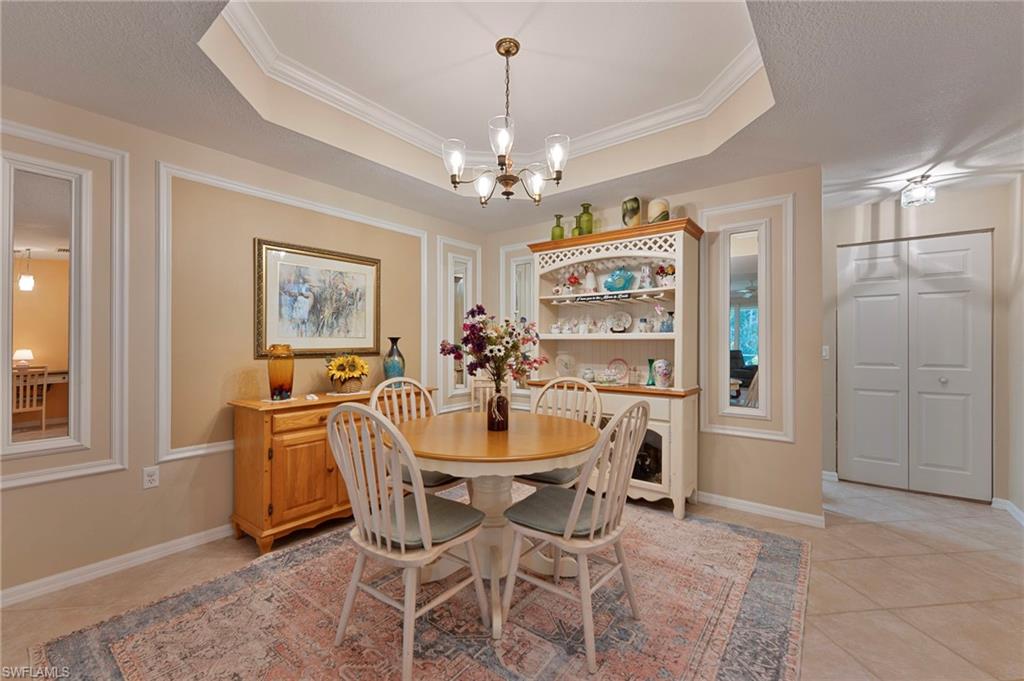 6765 Huntington Lakes Circle, Unit 102 Naples, FL 34119 - Photo 8 of 22 Graced by Tray Ceiling and Architectural Elements