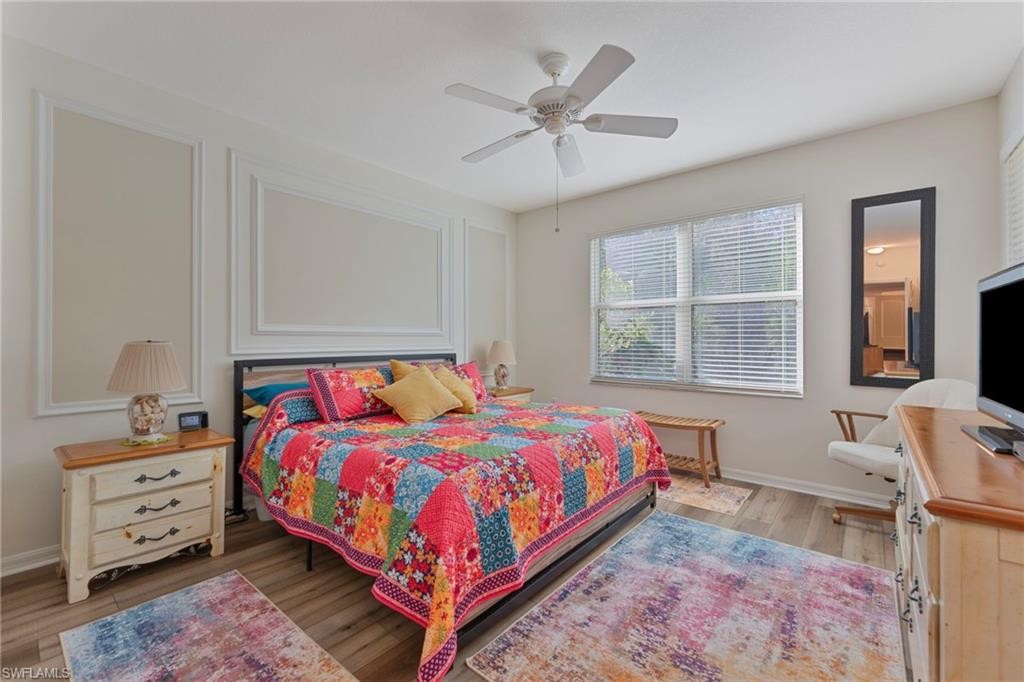 6765 Huntington Lakes Circle, Unit 102 Naples, FL 34119 - Photo 9 of 22 Inviting Master Bedroom with Separate Dressing Area and 2 Closets