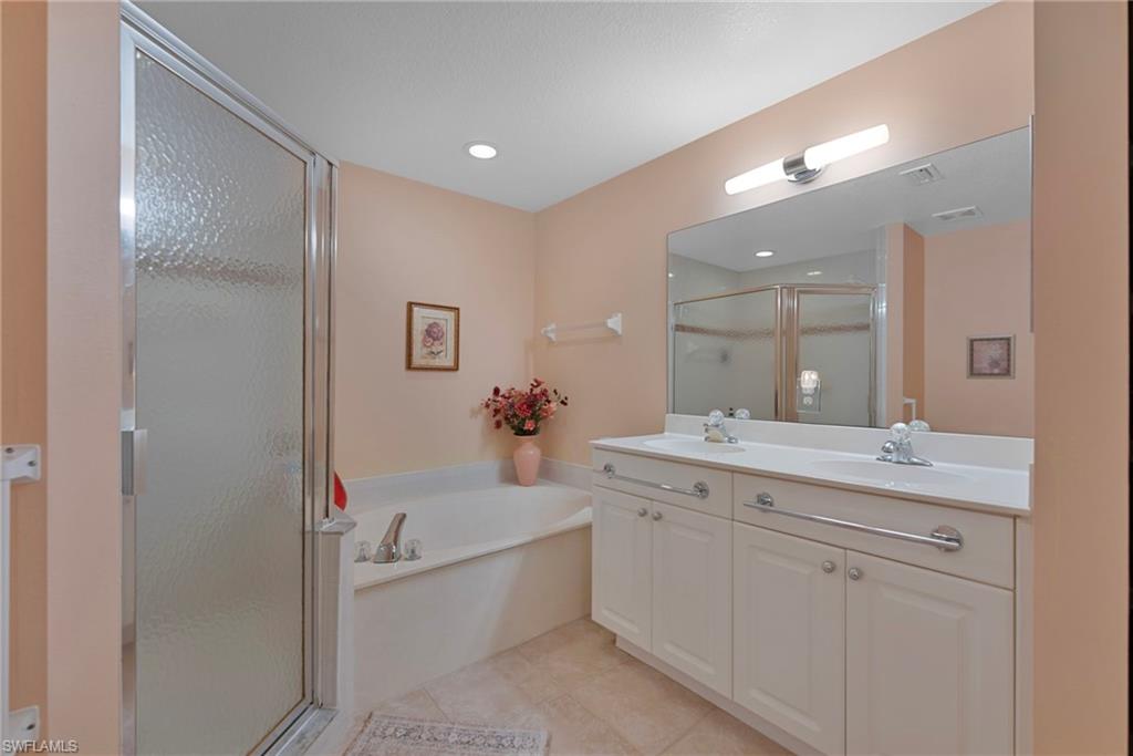6765 Huntington Lakes Circle, Unit 102 Naples, FL 34119 - Photo 10 of 22 Generously Sized Master Bath