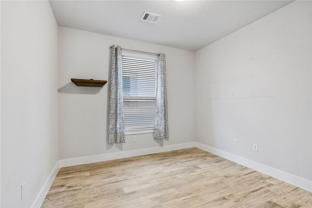 941 Del Raphael Drive Leander, TX 78641 - Photo 21 of 33 Double doors shut out the noise of the rest of the house, creating a quiet, intentional space to knock out the workday