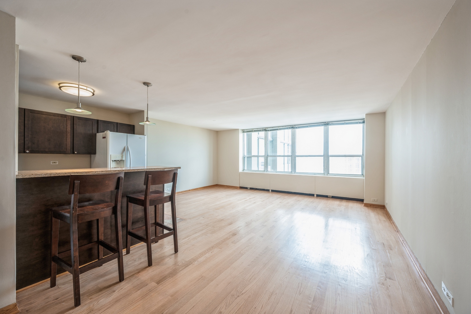 655 West Irving Park Road, Unit 2008 Chicago, IL 60613 - Photo 4 of 19 a view of a kitchen and dining room