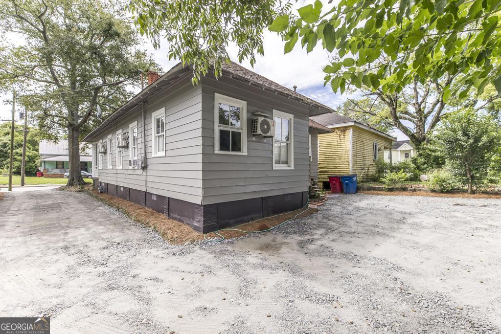 1475 3rd Street Macon, GA 31201 - Photo 35 of 37 a view of a house with a yard
