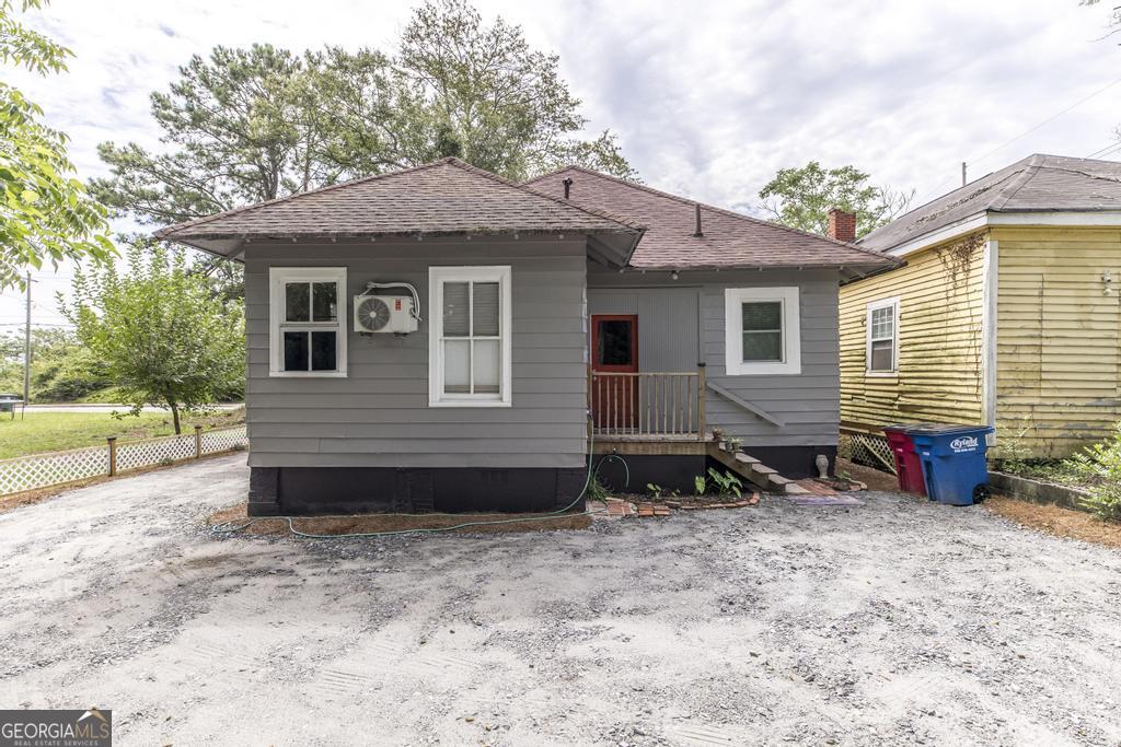 1475 3rd Street Macon, GA 31201 - Photo 36 of 37 a view of a house with a yard and sitting area