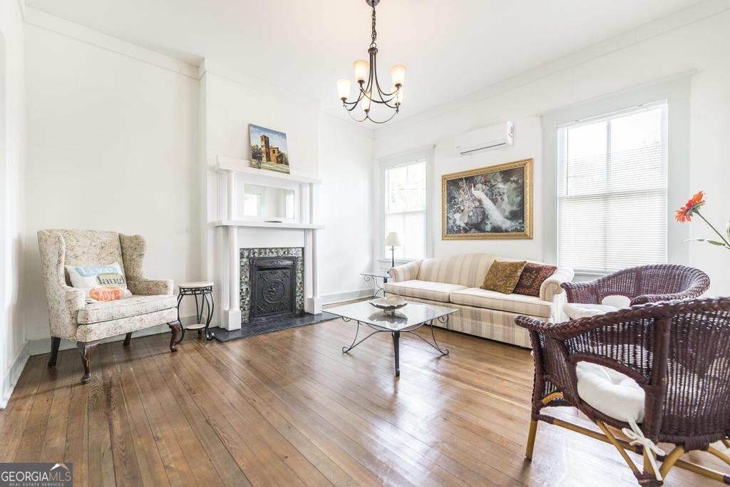 1475 3rd Street Macon, GA 31201 - Photo 10 of 37 a living room with furniture and a fireplace