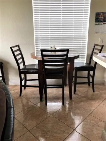 a view of a workspace and a window in a patio