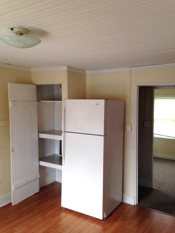5 Malta Street Hull, MA 02045 - Photo 12 of 16 a view of storage and utility room with wooden floor