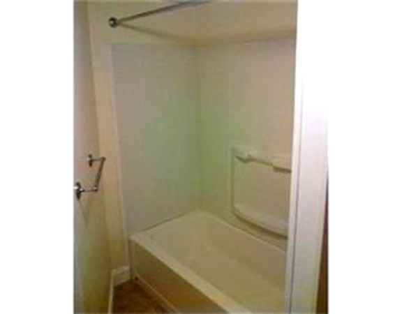 5 Malta Street Hull, MA 02045 - Photo 5 of 16 a bathroom with a bathtub