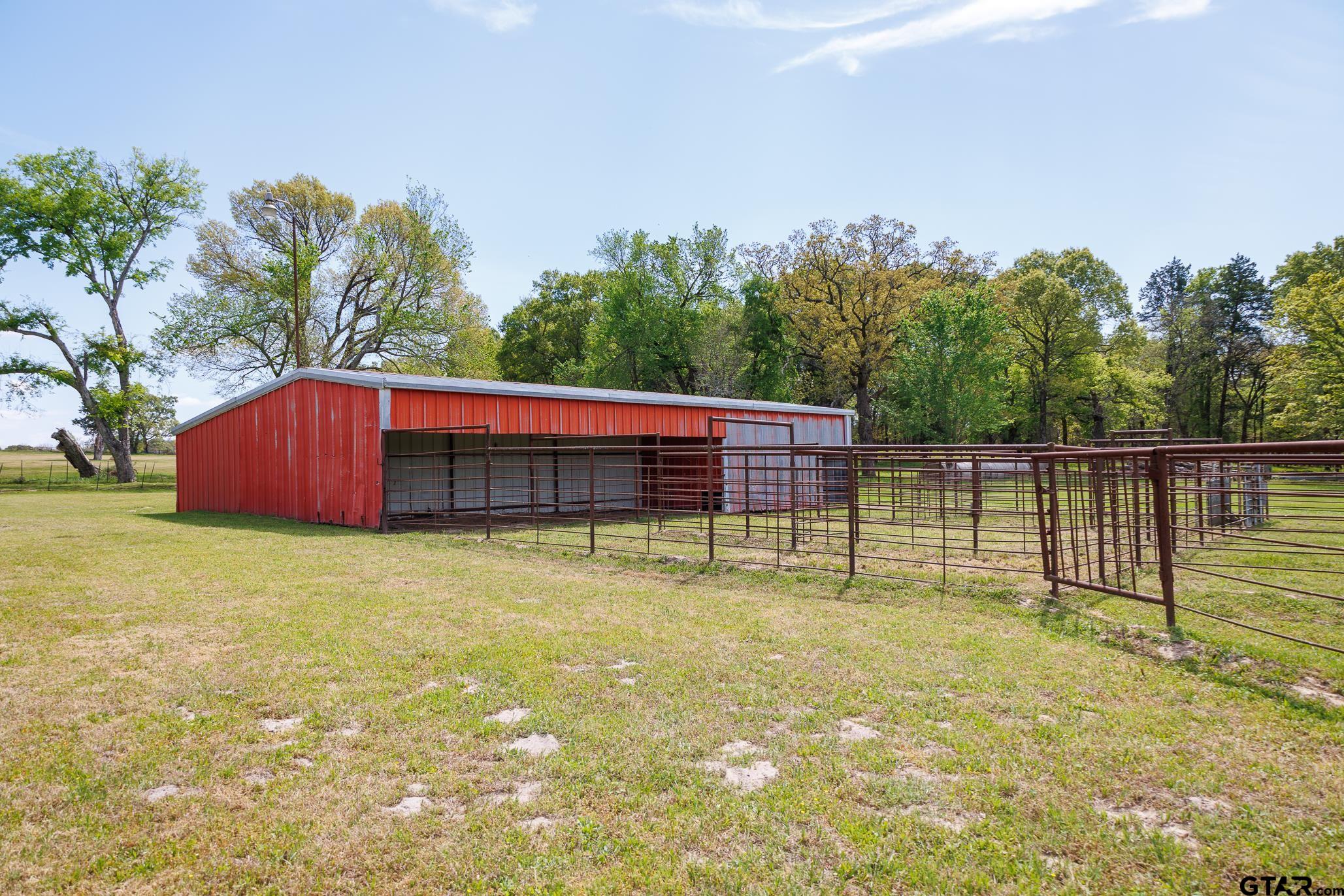 411 VZ County Road Ben Wheeler, TX 75754 - Photo 13 of 46 a backyard of a house with table and chairs