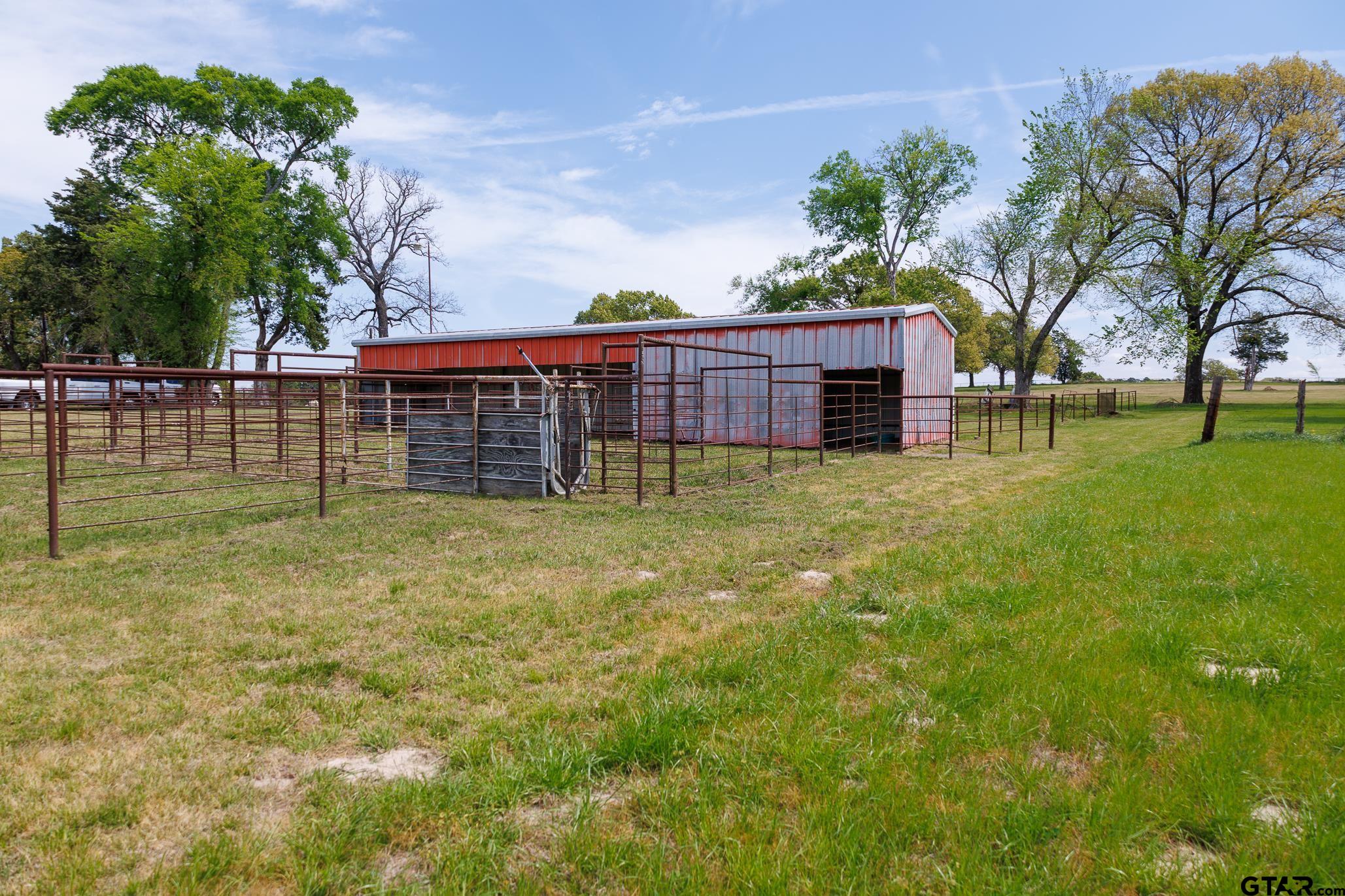 411 VZ County Road Ben Wheeler, TX 75754 - Photo 14 of 46 a view of a house with backyard and trees